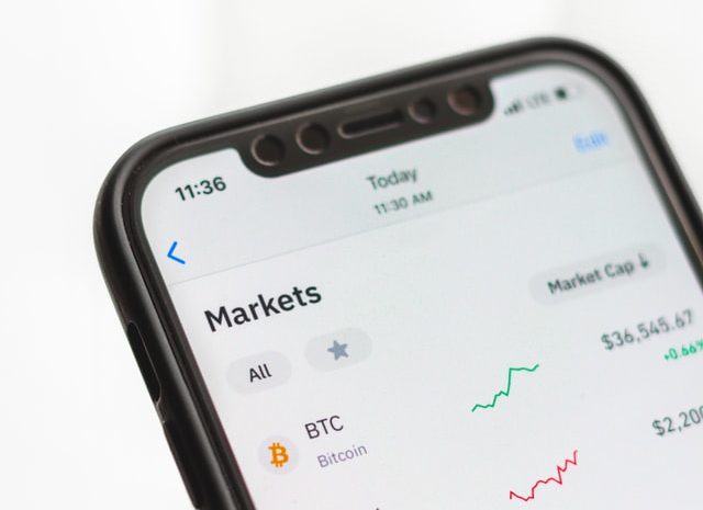 Different Cryptocurrencies displayed on a Smartphone